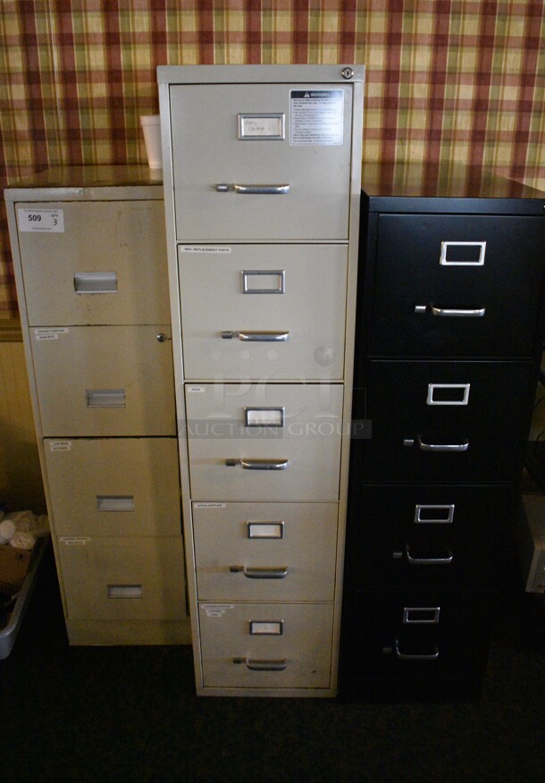 3 Various Metal Filing Cabinets; Black 4 Drawer, Tan 4 Drawer and Tan 5 Drawer. Includes 15x18x52. 3 Times Your Bid! (main dining room)