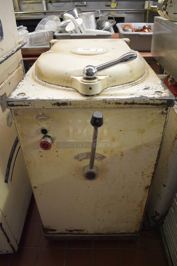 Model D-20 Metal Commercial Floor Style Dough Divider on Commercial Casters. Divides Into 20 Pieces. 220 Volts, 3 Phase. 22x30x42. Unit Was In Working Condition When Restaurant Closed.  (bakery kitchen)