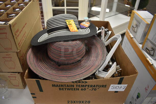 ALL ONE MONEY! Lot of Various Items Including Glass Vases, Metal Pieces, Hats and Folding Table! BUYER MUST REMOVE. (garden center) - Image 6 of 6