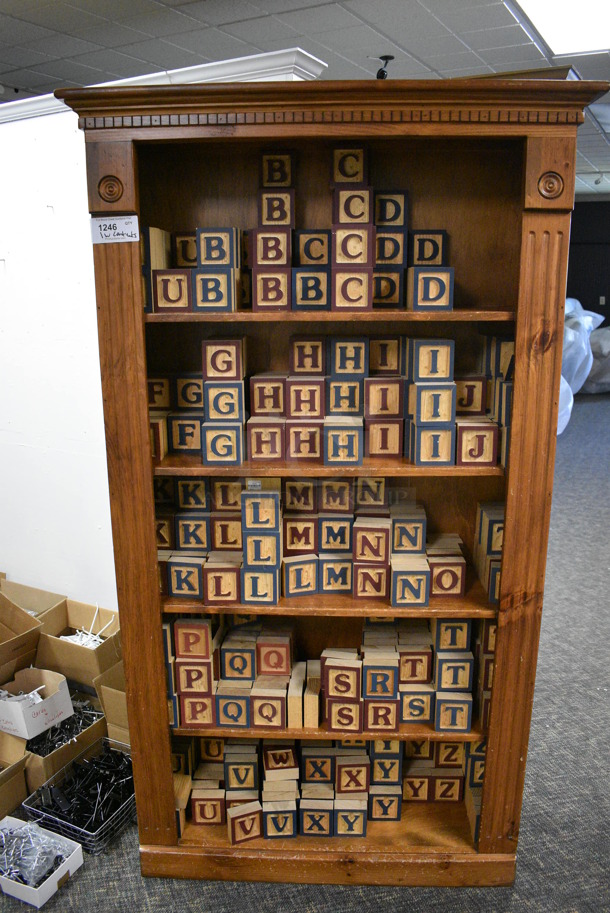 Wooden Shelving Unit w/ Wooden Letter Blocks. BUYER MUST REMOVE. 42x14x74. (garden center)