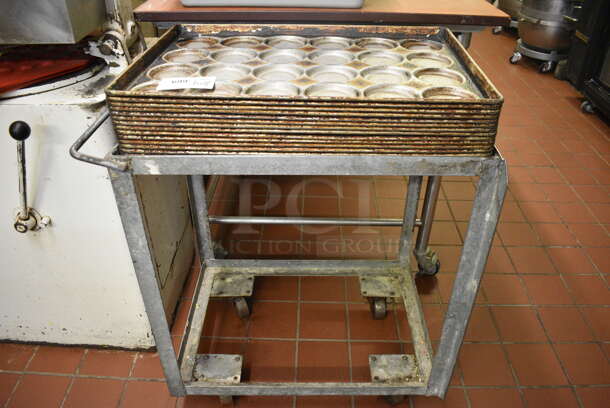 Metal Commercial Cart w/ Push Handle and 14 Metal 24 Cup Muffin Baking Pans on Commercial Casters. 22x29x31. 18x26x1.5. (bakery kitchen)