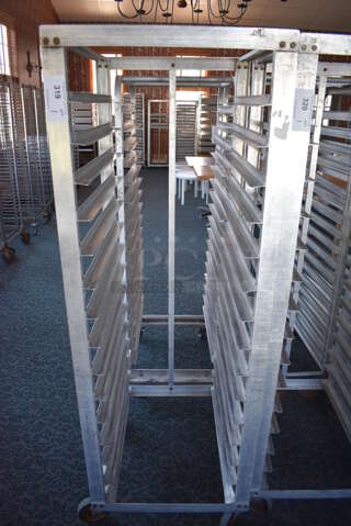 Metal Commercial Pan Transport Rack on Commercial Casters. 22.5x27x66. (sunroom dining room)