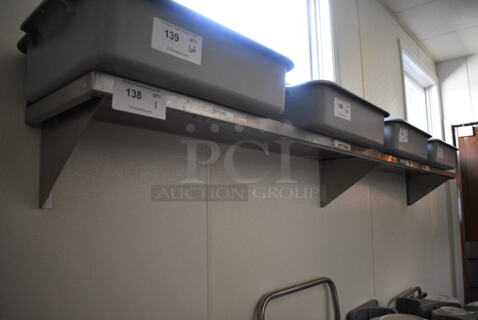 Stainless Steel Commercial Wall Mount Shelf. Does Not Include Contents. BUYER MUST REMOVE. 96x12x10. (kitchen hallway)