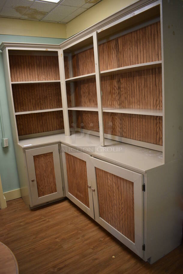 Wooden L Shaped Cabinet w/ Shelves and 3 Doors. BUYER MUST REMOVE. 83x42x88. (garden center)