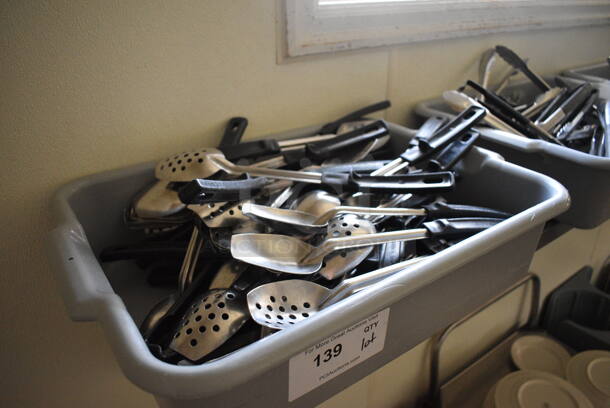 ALL ONE MONEY! Lot of Various Utensils Including Straining Serving Spoons in Gray Bus Bin! 21x15x5. (kitchen hallway) - Image 2 of 3