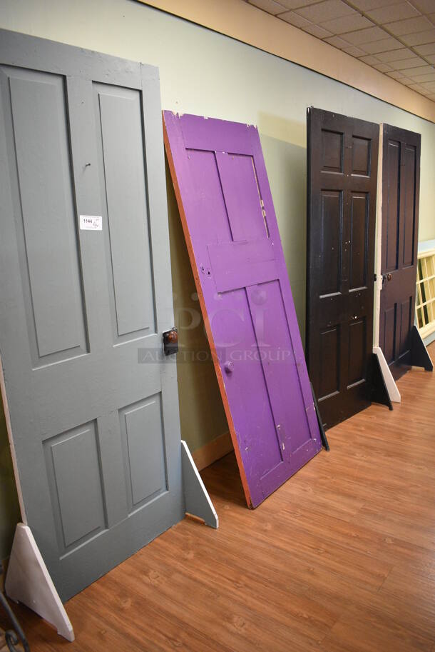 4 Various Doors; Gray, Purple, Black and Navy Blue. Includes 34x16x81. 4 Times Your Bid! (garden center)