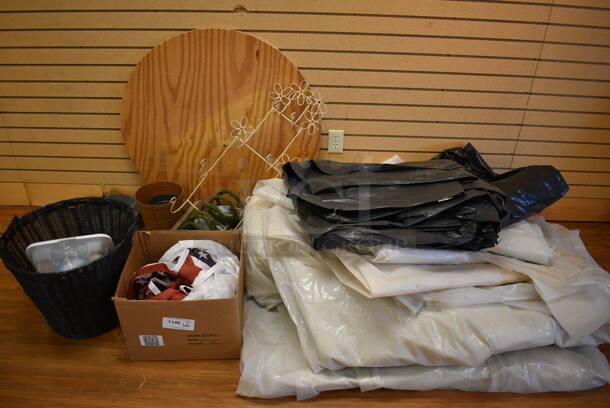 ALL ONE MONEY! Lot of Various Items Including Tarps, Black Basket and Round Wooden Plank. (garden center)
