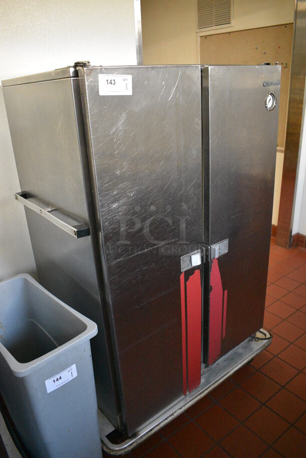 Carter Hoffmann Stainless Steel Commercial 2 Door Heated Holding Cabinet on Commercial Casters. 125 Volts, 1 Phase. 41x30x59. Unit Was In Working Condition When Restaurant Closed. (kitchen hallway) - Image 3 of 8