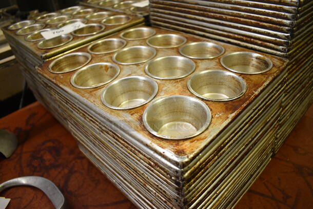 31 Metal 12 Cup Muffin Baking Pans. 10.5x14x1.5. 31 Times Your Bid! (bakery kitchen) - Image 2 of 3