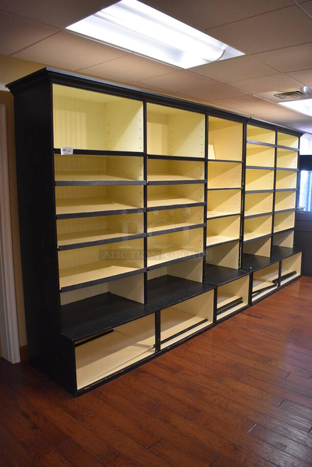 ALL ONE MONEY! Lot of 3 Yellow and Black Wooden Shelving Units. BUYER MUST REMOVE. 70x27.5x89, 30x27.5x89. (gift shop)