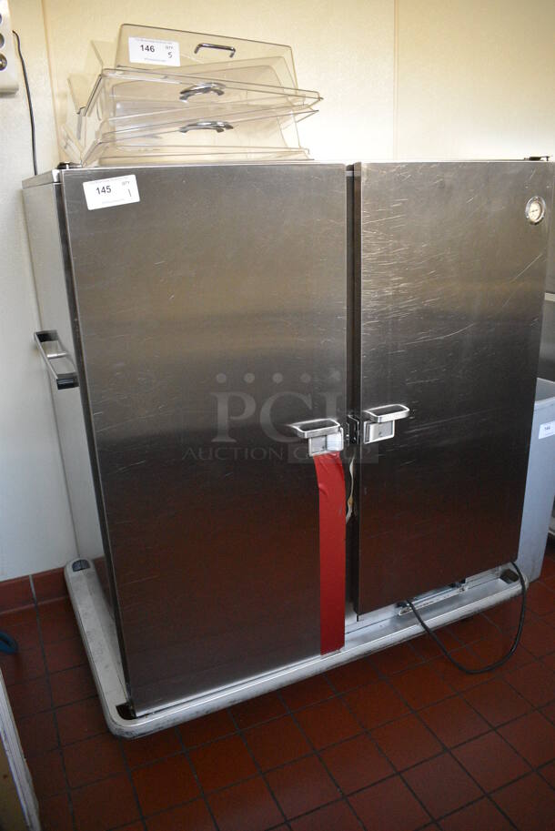 Carter Hoffmann Stainless Steel Commercial 2 Door Heated Holding Cabinet on Commercial Casters. 125 Volts, 1 Phase. 55x36x59. Unit Was In Working Condition When Restaurant Closed. (kitchen hallway) - Image 2 of 5