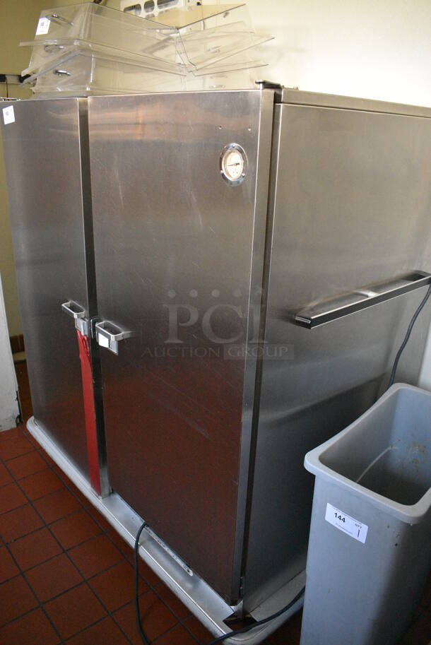 Carter Hoffmann Stainless Steel Commercial 2 Door Heated Holding Cabinet on Commercial Casters. 125 Volts, 1 Phase. 55x36x59. Unit Was In Working Condition When Restaurant Closed. (kitchen hallway) - Image 3 of 5