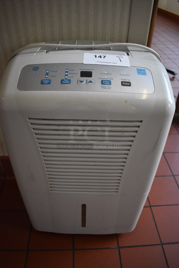 GE Model ADEW50LQQ1 Portable Dehumidifier. 115 Volts, 1 Phase. 16x10x24. (kitchen hallway)