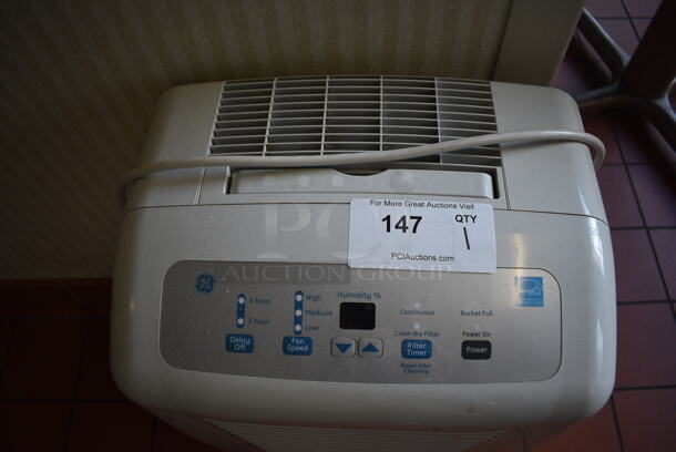 GE Model ADEW50LQQ1 Portable Dehumidifier. 115 Volts, 1 Phase. 16x10x24. (kitchen hallway) - Image 3 of 4