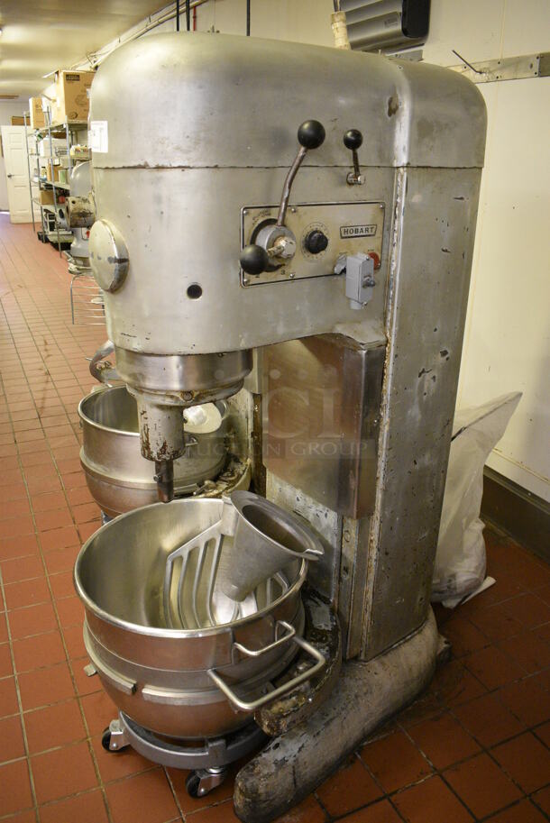 Hobart Model M-802 Metal Commercial Floor Style 80 Quart Planetary Dough Mixer w/ Stainless Steel Mixing Bowl, Bowl Dolly, Paddle and Dough Hook Attachments. 220 Volts, 3 Phase. 27x42x65. Unit Was In Working Condition When Restaurant Closed. (bakery kitchen)