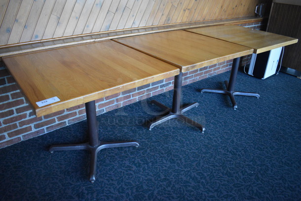 3 Wooden Tables on Metal Table Base. 36x36x30. 3 Times Your Bid! (back dining room)