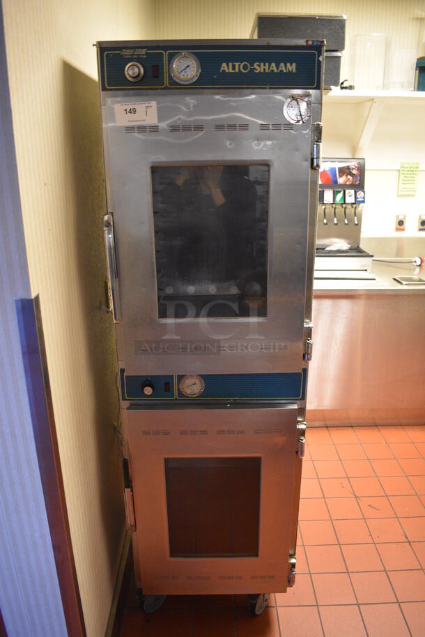 Alto Shaam Model 1000-UP/P Stainless Steel Commercial 2 Half Size Door Cook N Hold Cabinet on Commercial Casters. 208-240 Volts. 22x30x74. Unit Was In Working Condition When Restaurant Closed. (kitchen hallway)