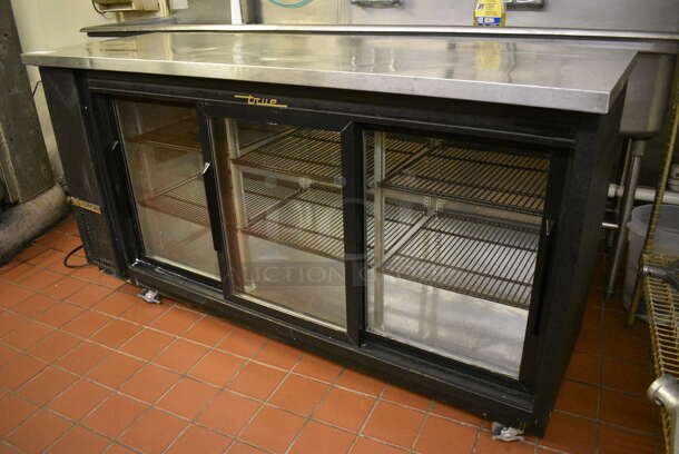 2012 True Model TBB-24-72G-SD Stainless Steel Commercial 3 Door Back Bar Cooler Merchandiser on Commercial Casters. 115 Volts, 1 Phase. 73x24.5x39.5. Unit Was In Working Condition When Restaurant Closed. (bakery kitchen) - Image 2 of 6