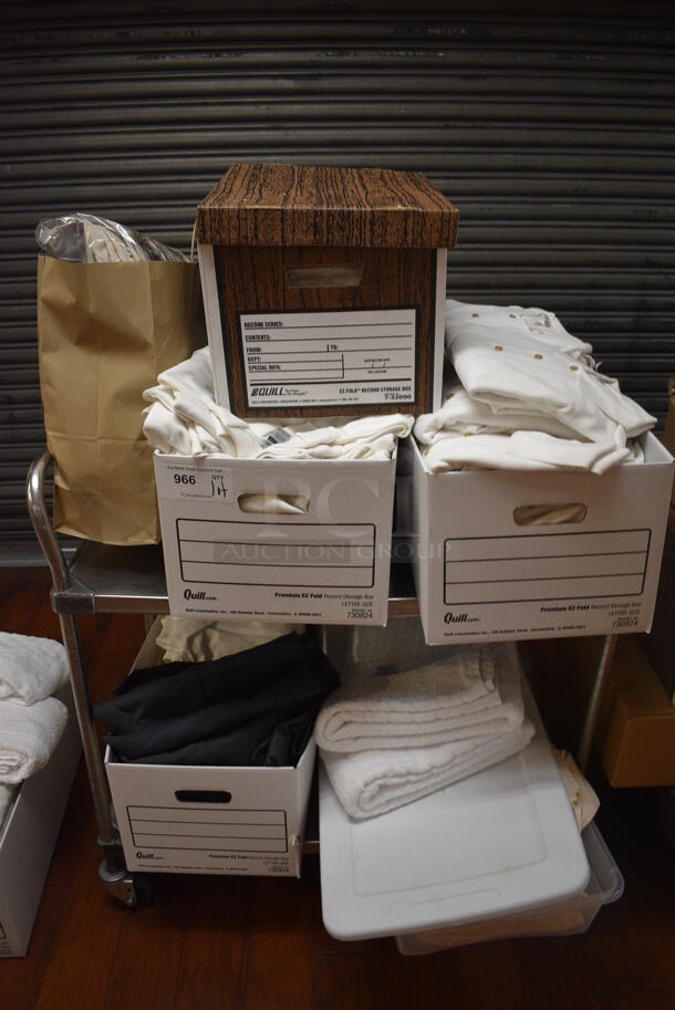 ALL ONE MONEY! Lot of Metal 2 Tier Cart w/ Push Handle and Contents Including Shirts on Commercial Casters. 36x21x37.5. (gift shop) - Image 1 of 7