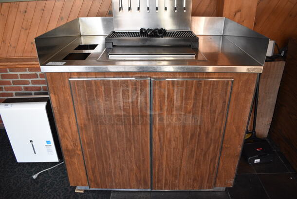 Stainless Steel Commercial Soda Station w/ In Counter Ice Bin, Side / Back Splash Guards and Wooden Doors. Does Not Come w/ Soda Machine. BUYER MUST REMOVE. 48x32x47.5. (back dining room)
