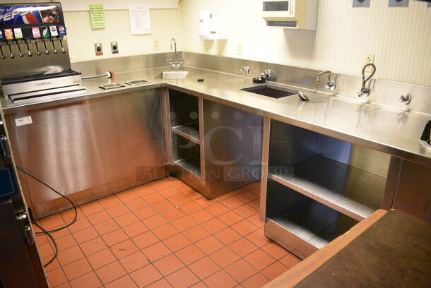 Stainless Steel Commercial L Shaped Table / Soda Station w/ Under Shelves and Sink Basin. Does Not Include Soda Machine. BUYER MUST REMOVE. 75x118x42. (kitchen hallway)