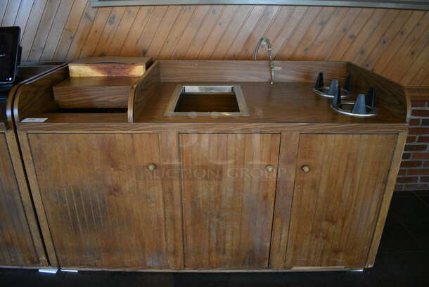 Wooden Counter w/ 3 Doors and 2 Well Plate Return. Does Not Include Contents. BUYER MUST REMOVE. 67.5x31x41.5. (back dining room)