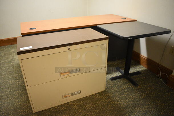 ALL ONE MONEY! Lot of Desk, Tan Metal Filing Cabinet and Wood Pattern Table. Includes 71x29.5x30. (office behind gift shop)
