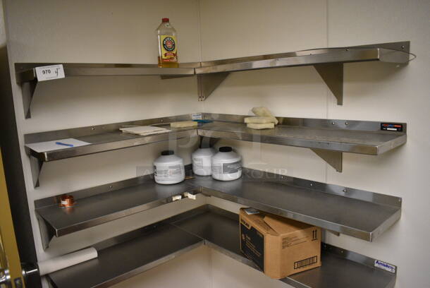 4 Stainless Steel L Shaped Shelves. BUYER MUST REMOVE. 48x12x10, 30x12x10. 4 Times Your Bid! (office behind gift shop)