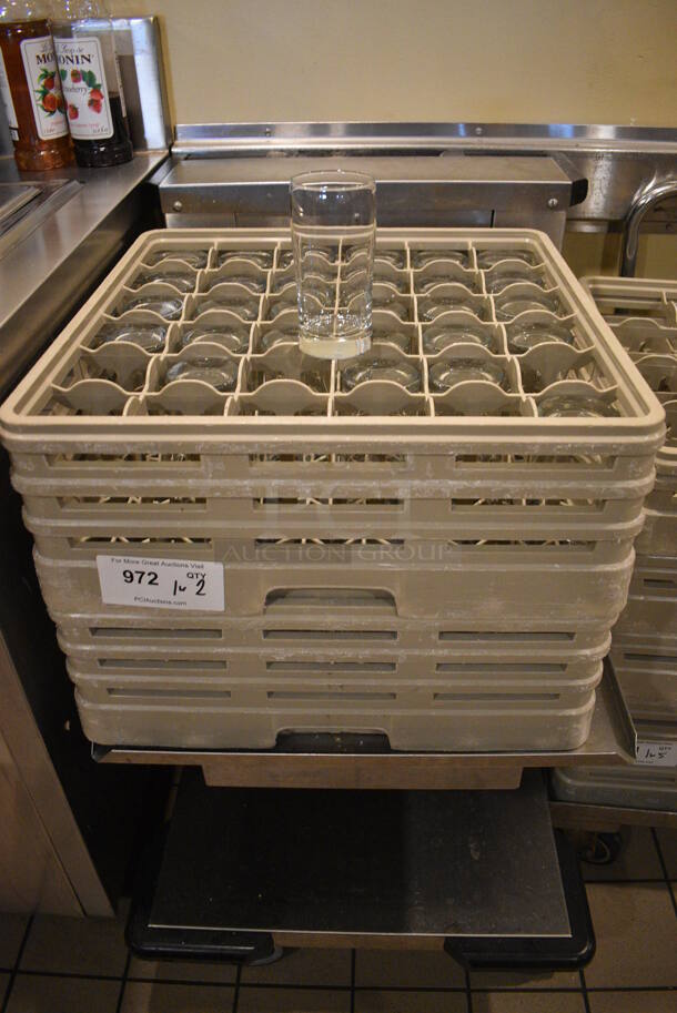 Stainless Steel Dish Cart w/ 2 Tan Dish Caddies and Approximately 60 Beverage Glasses on Commercial Casters. 22x32x25. 2.75x2.75x5.5. (employee breakroom)