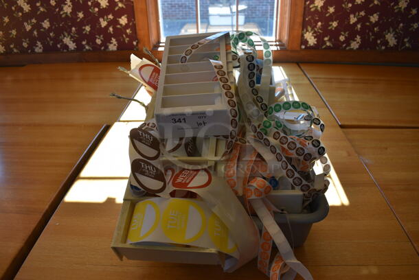 ALL ONE MONEY! Lot of Sticker Rolls and Holders in Gray Bus Bin! 22x17x5. (back dining room)