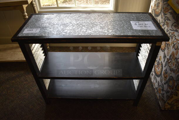 Black Wooden Table w/ Metal Tabletop and 2 Under Shelves. 36x14x30.5. (garden center)