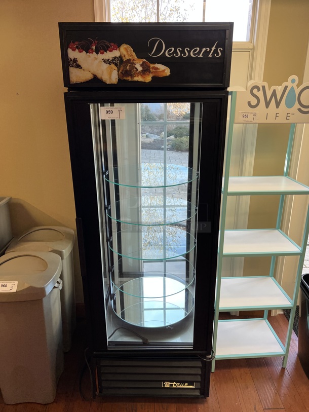 2011 True Model G4SM-23RGS Metal Commercial Single Door Reach In Cooler Merchandiser. 115 Volts, 1 Phase. Unit Was In Working Condition When Restaurant Closed. (gift shop)