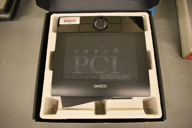 IN ORIGINAL BOX! Bamboo Tablet. 8x7.5x0.5. (south basement 019) - Image 1 of 4