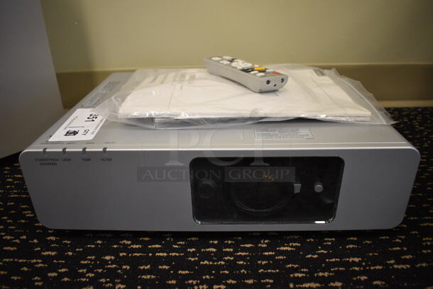 Panasonic Model PT-F200NTU LCD Projector. 100-240 Volts, 1 Phase. 17x12.5x5. (room 204)