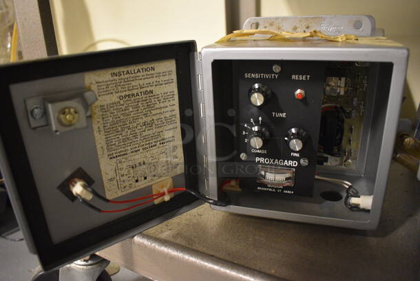 ALL ONE MONEY! Lot of 2 HP Harrison 6434B DC Power Supply and 4 Gordon Proxagard Boxes on Metal Cart. 24x18x26. (south basement 012) - Image 7 of 11