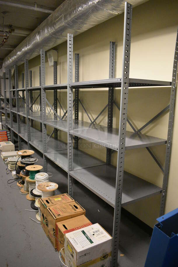 Gray Metal Shelving Unit. BUYER MUST REMOVE: Give Yourself Ample Time To Remove This Item on Pick Up Day. 415x24x87. (south basement 012) - Image 1 of 5