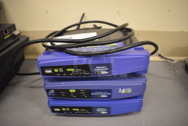 3 Linksys Wireless Broadband Routers. 7.5x7.5x1.5. 3 Times Your Bid! (south basement 019)