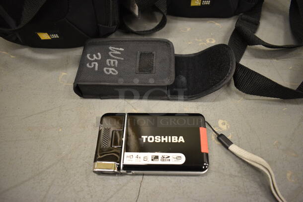 9 Soft Bags w/ Contents Including Toshiba Cameras and Wires! 6x4x7. 9 Times Your Bid! (south basement 019) - Image 1 of 7