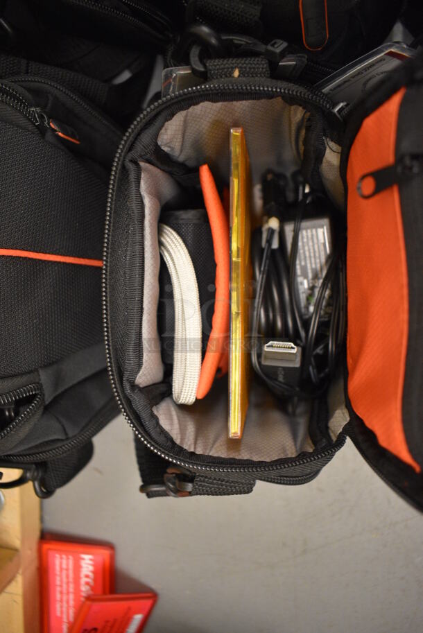 9 Soft Bags w/ Contents Including Toshiba Cameras and Wires! 6x4x7. 9 Times Your Bid! (south basement 019) - Image 3 of 7