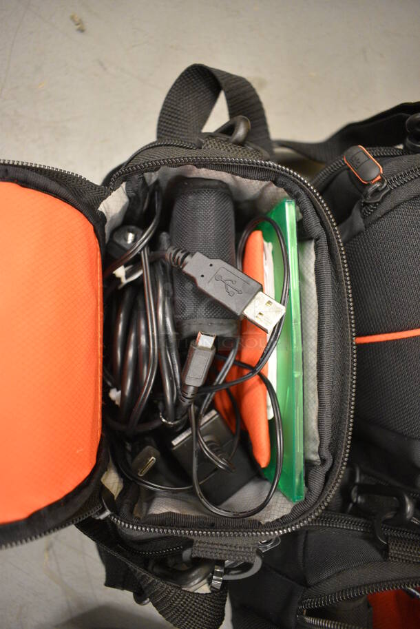 9 Soft Bags w/ Contents Including Toshiba Cameras and Wires! 6x4x7. 9 Times Your Bid! (south basement 019) - Image 5 of 7