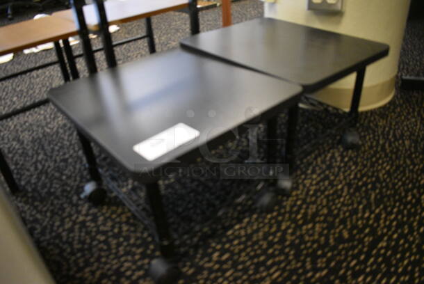 2 Black End Tables w/ Wire Under Shelf on Casters. 19x16x13.5. 2 Times Your Bid! (room 220) - Image 2 of 3