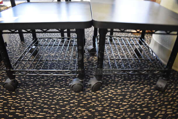 2 Black End Tables w/ Wire Under Shelf on Casters. 19x16x13.5. 2 Times Your Bid! (room 220) - Image 3 of 3