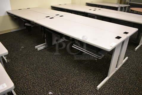 4 Gray Tables. 71.5x23.5x29.5. 4 Times Your Bid! (room 220)