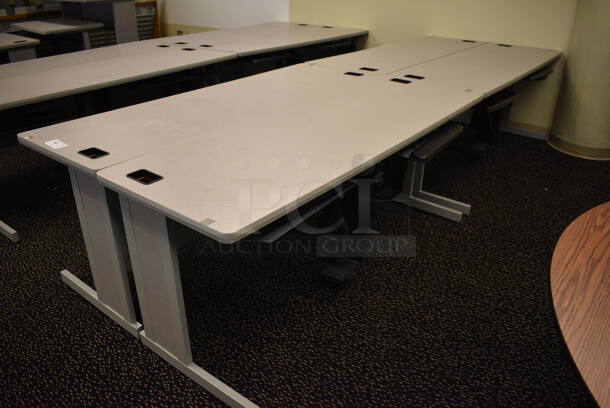 4 Gray Tables. 71.5x23.5x29.5. 4 Times Your Bid! (room 220)