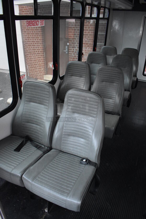 2015 Ford Bus w/ 14 Individual Passenger Seats. Odometer Reads 36,679.9. VIN 1FDEE3FS0FDA17475. Title In Hand. Vehicle Needs a New Transmission; Comes w/ Inoperable Transmission. Vehicle Will Need To Be Towed. See Lot #4 For Additional Pictures. - Image 7 of 12