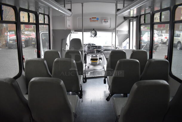 2015 Ford Bus w/ 14 Individual Passenger Seats. Odometer Reads 36,679.9. VIN 1FDEE3FS0FDA17475. Title In Hand. Vehicle Needs a New Transmission; Comes w/ Inoperable Transmission. Vehicle Will Need To Be Towed. See Lot #4 For Additional Pictures. - Image 10 of 12