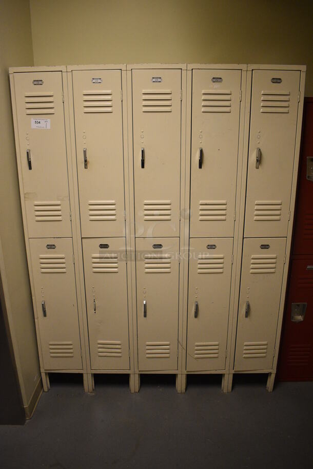 Tan Metal 10 Cubby Locker. 60x18x78. (north basement hallway)