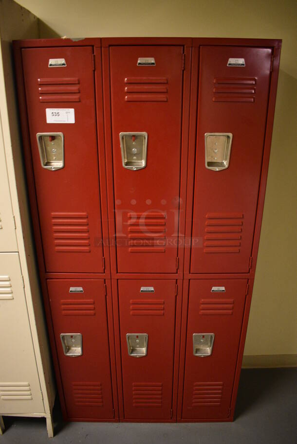 Red Metal 6 Cubby Locker. 36x15x72. (north basement hallway)
