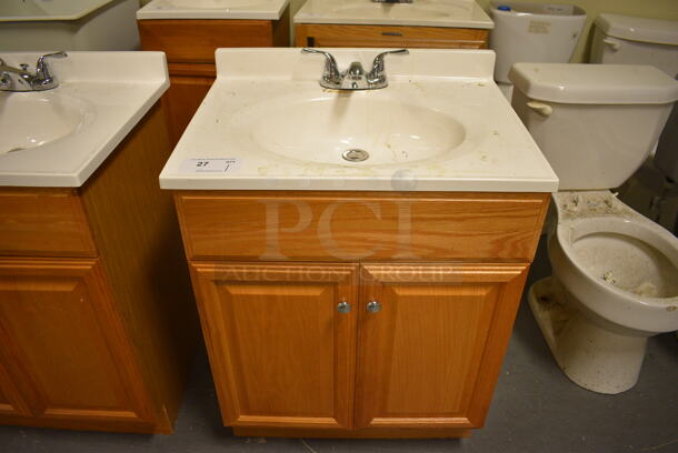 Bathroom Sink w/ Faucet, Handles and 2 Wood Pattern Doors. 25x19x34. (room 102)