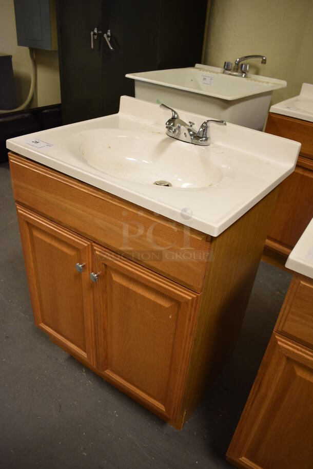 Bathroom Sink w/ Faucet, Handles and 2 Wood Pattern Doors. 25x19x34. (room 102) - Image 2 of 6